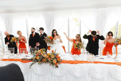 Bride, groom and wedding party at the top table during the Millbrook Lodge reception in Ballynahinch