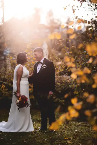 Bride and groom share a quiet golden hour portrait in the gardens at Cavan Crystal, County Cavan