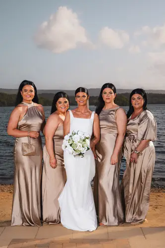 Bride and bridesmaids in sunny lakeside portraits at Rossharbour Resort, Lough Erne